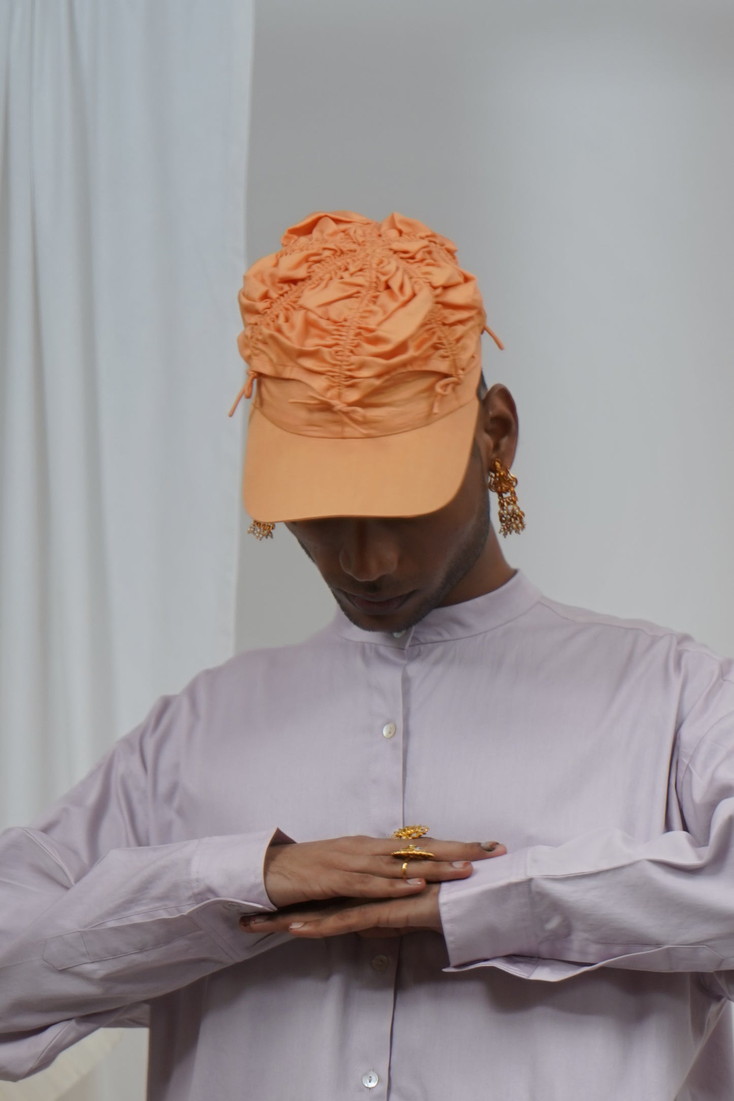 Gathered umbrella cap