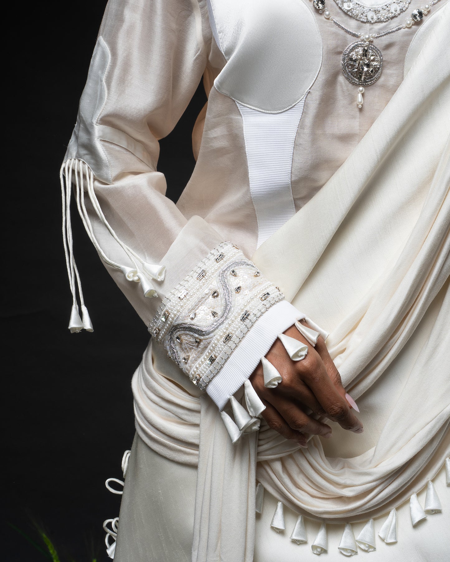 Sculptural necklace top + Tassel drape one shoulder + Outline godet trouser set