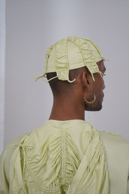Strapped round topi
